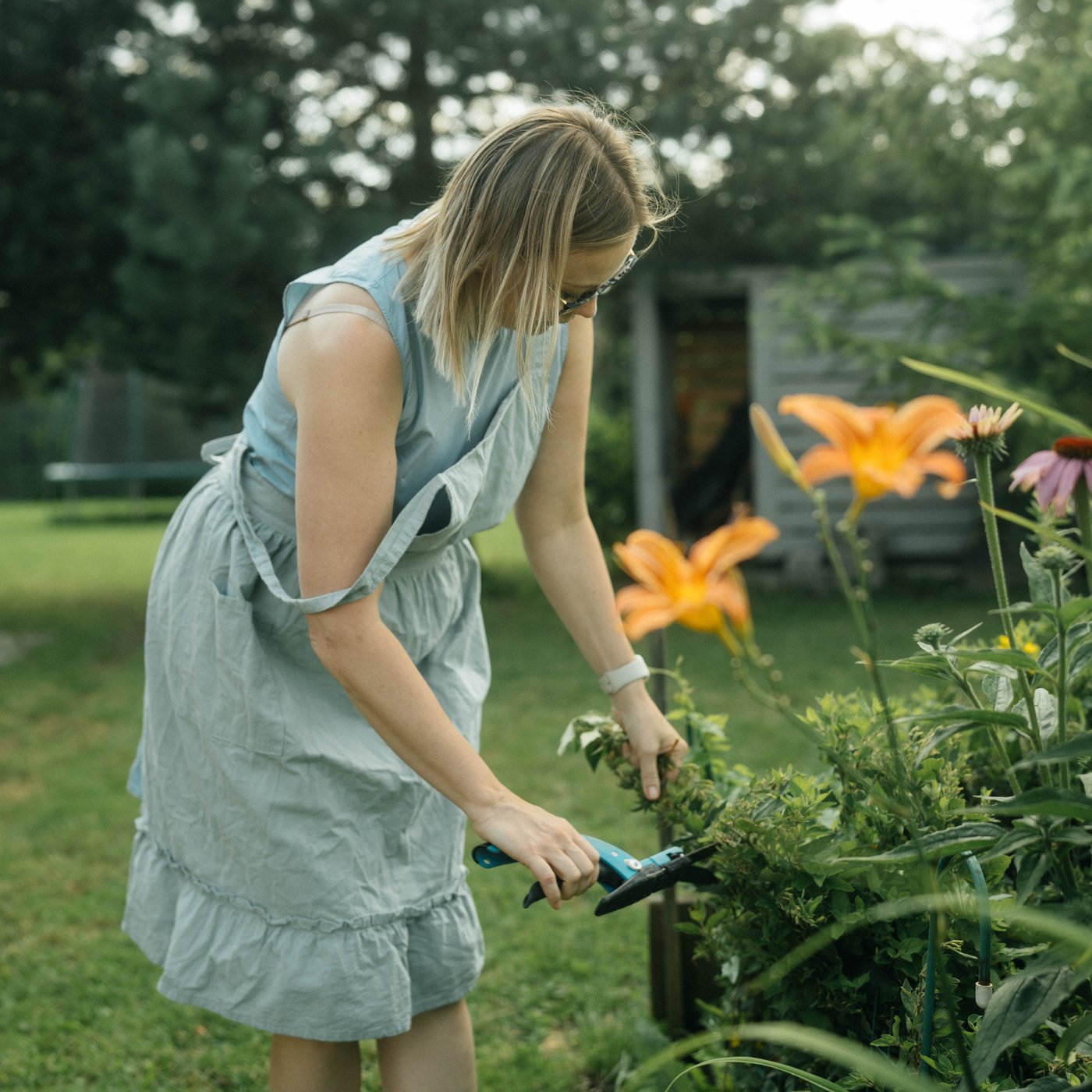 Katya tending the garden